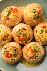 Sev puri - Indian snack and a type of chaat. Popular in Mumbai/pune from Maharashtra. it's a roadside food also served as a starter in restaurants