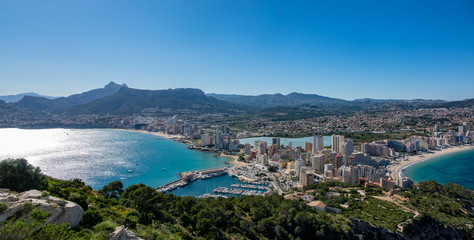 Fototapeta premium Beaches and mountains of Calpe. View from the natural park of Penyal d'Ifac, Spain