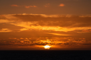 Fototapeta na wymiar Clouded sunrise
