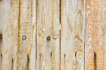 Texture of wooden boards with cracks and knots for backgrounds