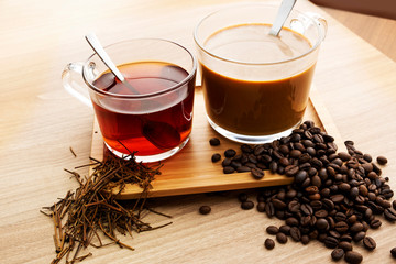 Hot tea and coffee With tea leaves and coffee beans