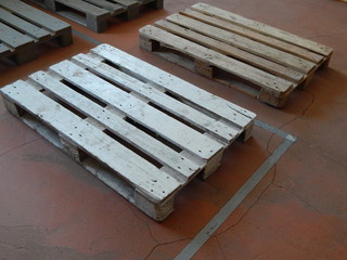 Old wooden pallets for the transportation of goods