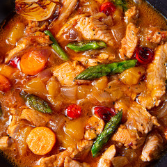 colorful turkey fricassee with asparagus and paprika