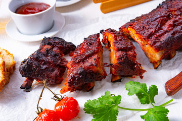 BBQ spare ribs from a charcoal grill