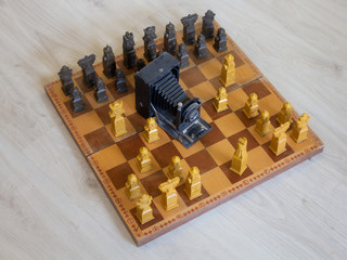 old foto camera and chess