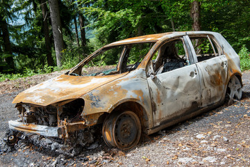 Carbonized car. Completely burnt out and carbonised car