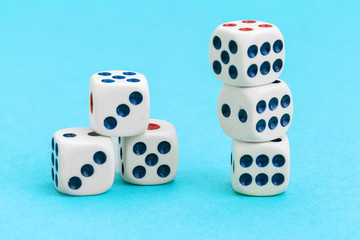Gaming dices on blue background. Game concept.