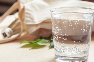 Glass of pure water on kitchen table