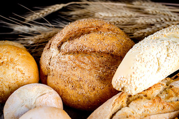 Assortment of baked goods in black background