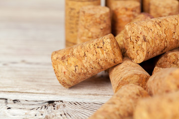 Bunch of wine corks on wooden table