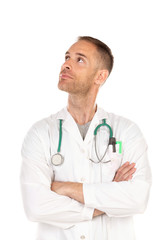 Fototapeta premium Pensive young doctor wearing a white gown