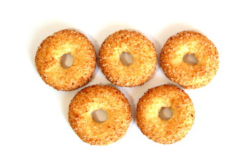 A variety of shaped cookies. White cup of tea. Morning is sweet. Tea ceremony.