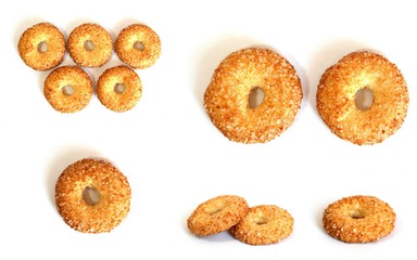 A variety of shaped cookies. White cup of tea. Morning is sweet. Tea ceremony.