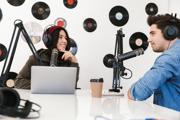 Two radio hosts moderating a live show
