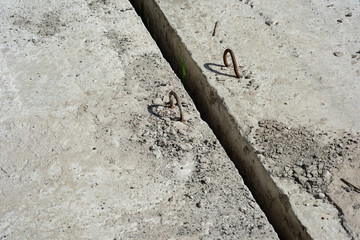 Background of concrete slabs with mounting loops