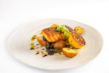 Salmon steak grilled with lemon on white background