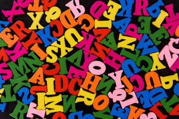 Colorful wooden letters, alphabet, close up .