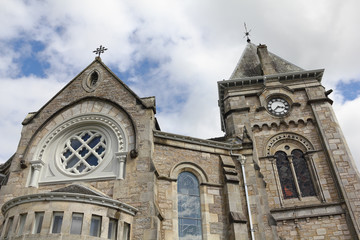 Fototapeta na wymiar Steeple and gable of the Pitlochry Parish Church in Scotland