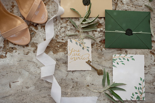 Wedding invitation as a decorated letter in an envelope in the style of boho