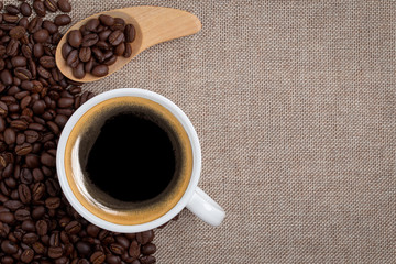 coffee cup on sackcloth background