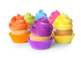 Sweet tasty cupcakes on white background