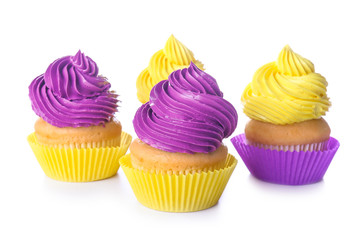 Sweet tasty cupcakes on white background