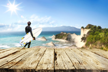 Desk of free space and summer beach background 