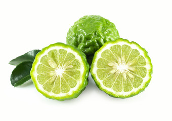Fototapeta na wymiar Fresh bergamot fruit slice with green leaf isolated on white background, herb and medical