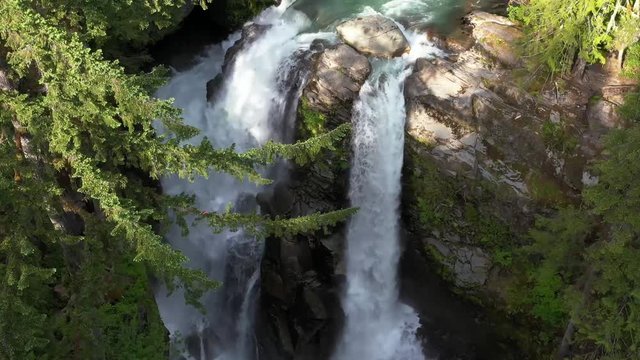 Close up of waterfall tilt up shot