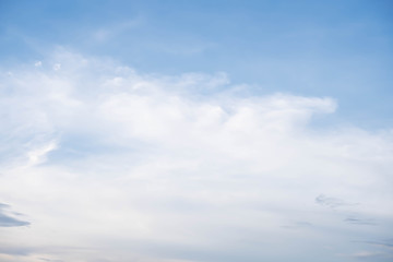 The white clouds in the sky background