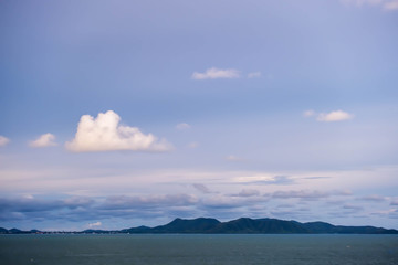 The white clouds in the sky background