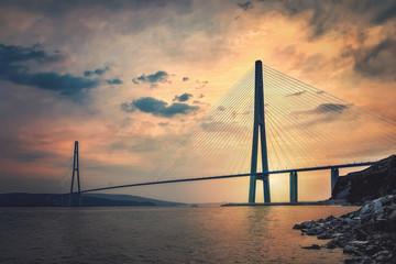 Obraz premium Russian bridge in Vladivostok at sunset