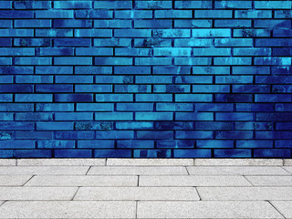 Old blue brick wall background with floor.