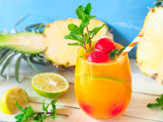 Pineapple juice topping with watermelon and fresh mint for summer drinks concept.