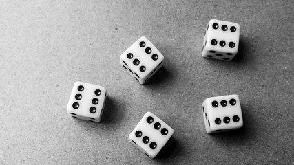 Dice black and white - the concept of play and unpredictability