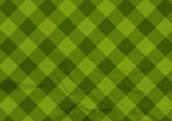 Green folded diagonal tartan paper texture background.