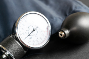 tonometer for measuring blood pressure on the table on a black background
