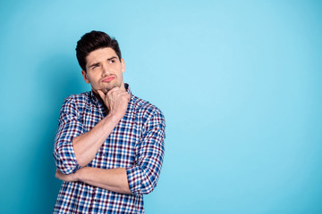 Close up photo amazing he him his macho look up empty space unsure doubtful arm touch chin think...