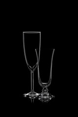 Glassware silhouettes on black.