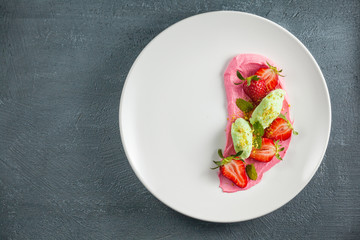 Strawberry dessert with mint.