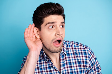 Close up photo amazing he him his macho listen rumours chatterbox person show big interest hand arm...