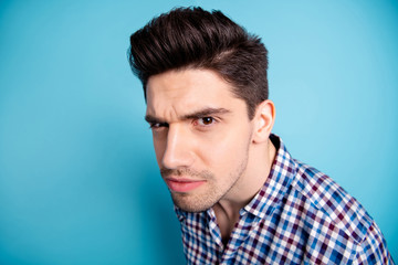 Fototapeta premium Close up photo amazing he him his macho listen wondered rumours chatterbox not believe inquisitive facial expression wait hear truth wear casual checkered plaid shirt isolated bright blue background