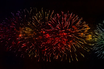 Fireworks over the water Holiday light. Night cityscape scene. Neva river, Saint-Petersburg,...