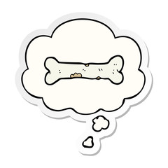 cartoon bone and thought bubble as a printed sticker