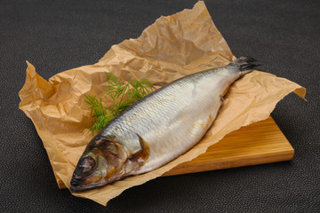 Salted herring over the wooden board