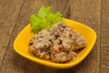 Chicken liver with cream and dry tomatoes