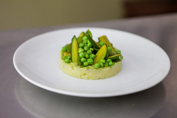 Food on the table. Different meals. Tasty looking plates with international food. Lasagna, pasta, pesto, tapas, salad and dumplings. Burgers and green. Yammy