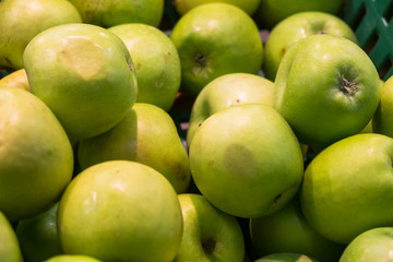 green apples on a black background