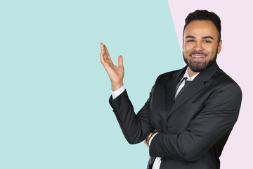 Young african american man wearing a shirt very happy pointing with hand