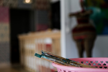 brushes and paint on background